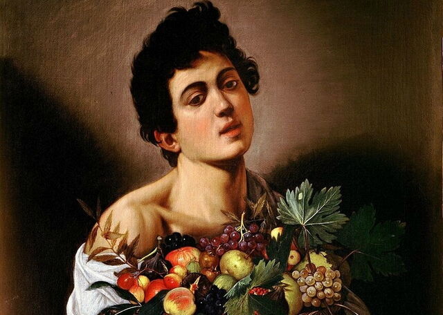 garçon et panier de fruits