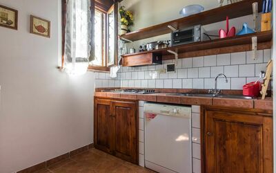 Panfilo: Propriété, Pièce, Cuisine, Meubles, Bâtiment, Cabinetry, Maison, Immobilier, Design Intérieur, Comptoir