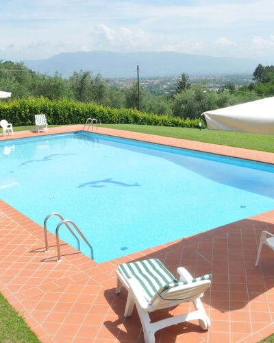 Villa Vaniglia Proprietà: Piscine, Propriété, Herbe, Loisir, Immobilier, Maison, Ombre, Rectangle, Bâtiment, Villa