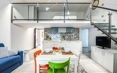 Loft In Sorrento: Table, Meubles, Propriété, Cabinetry, Canapé, Bleu, Bâtiment, Design Intérieur, Éclairage, Comptoir