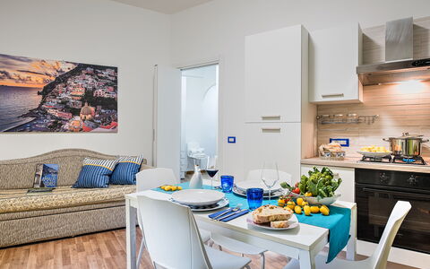 Loving Times Apartment: Table, Propriété, Meubles, Aliments, Bleu Azur, Vaisselle, Canapé, Design Intérieur, Bois, Salon