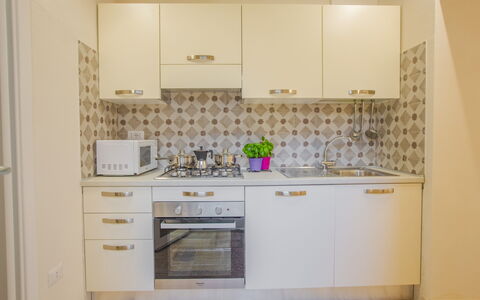 Casa Ettore: Appareil De Cuisine, Cuisine, Principaux Appliance, Comptoir, Cabinetry, Bois, Sol, Design Intérieur, Sol, Cuisinière