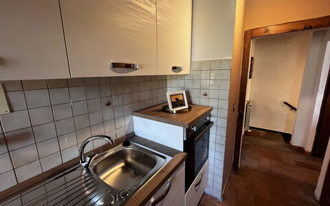 Appartamento Del Mercato: Cuisine, Comptoir, Sol, Appareil De Cuisine, Evier, Bois, Principaux Appliance, Sol, Cabinetry, Luminaire Plomberie