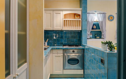 Suite la Torre: Cuisine, Comptoir, Appareil De Cuisine, Principaux Appliance, Design Intérieur, Sol, Cabinetry, Sol, Pièce, Électroménager