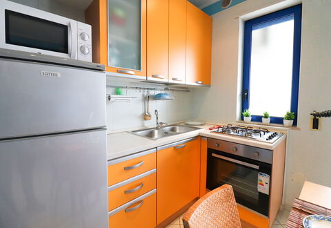 Circe Sea View: Cuisine, Appareil De Cuisine, Principaux Appliance, Comptoir, Bois, Evier, Cuisinière, Cabinetry, Le Fourneau, Design Intérieur