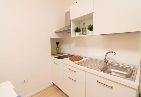 Penelope'S House Centro Storico: Design Intérieur, Cuisine, Comptoir, Bois, Sol, Appareil De Cuisine, Cabinetry, Sol, Principaux Appliance, Pièce