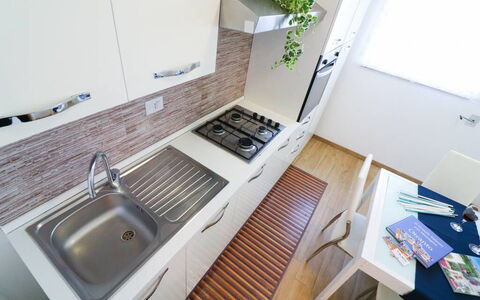 Casa Aurora a Otranto: Cuisine, Comptoir, Evier, Principaux Appliance, Appareil De Cuisine, Sol, Bois, Évier, Luminaire Plomberie, Design Intérieur