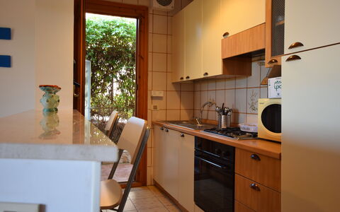 Il Favollo: Cuisine, Comptoir, Appareil De Cuisine, Design Intérieur, Principaux Appliance, Sol, Cabinetry, Bois, Meubles, Sol