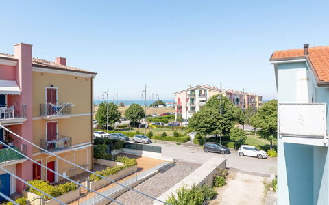 Seaside Apartment: Zone Résidentielle, Appartement, Quartier, Design Urbain, Établissements Humains, Domicile, Condominium, Balcon, Usage Mixte, Banlieue
