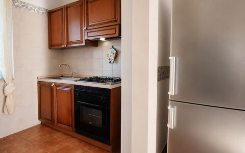 Villa Gertrude: Appareil De Cuisine, Cuisine, Principaux Appliance, Bois, Sol, Comptoir, Cabinetry, Design Intérieur, Sol, Meubles