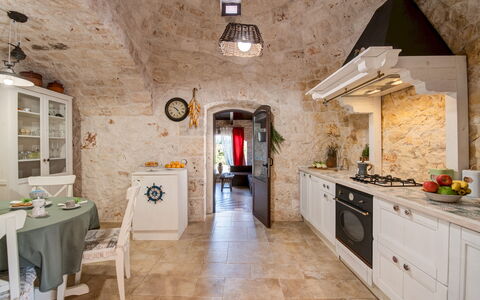 Trulli Littoria 4: Design Intérieur, Sol, Meubles, Plafond, Sol, Éclairage, Cuisine, Cambre, Luminaire, Chaise