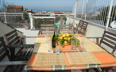 Exclusive Terrace Solarium equipped with sun beds, sun chairs, shower, tables, chairs, barbecue